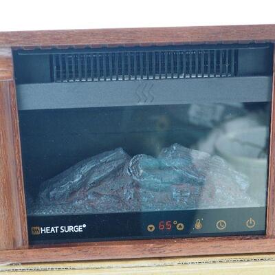 Lot 51  New Heat Surge electric fireplace