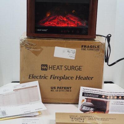 Lot 51  New Heat Surge electric fireplace
