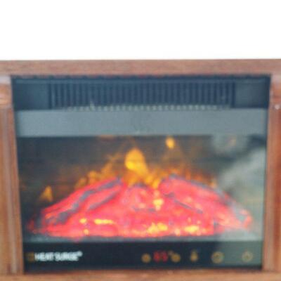 Lot 51  New Heat Surge electric fireplace