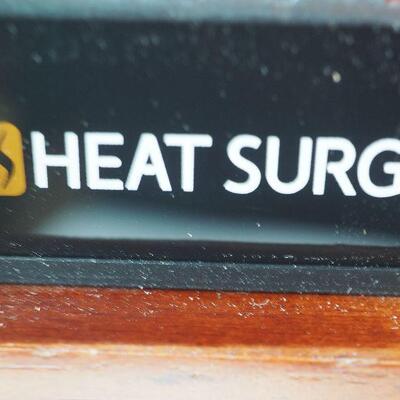 Lot 51  New Heat Surge electric fireplace