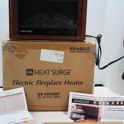 Lot 51  New Heat Surge electric fireplace