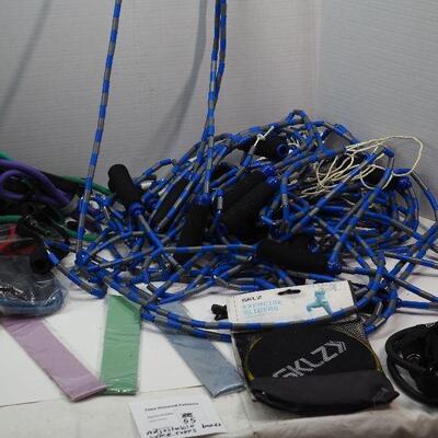 Lot 55 Bead jump ropes, therabands, sliders bands