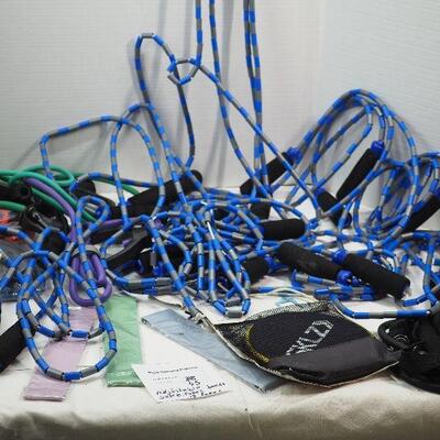 Lot 55 Bead jump ropes, therabands, sliders bands
