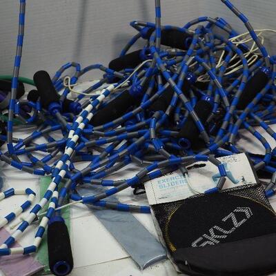 Lot 55 Bead jump ropes, therabands, sliders bands