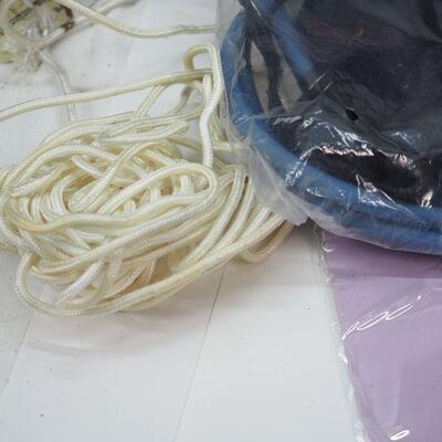 Lot 55 Bead jump ropes, therabands, sliders bands
