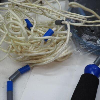 Lot 55 Bead jump ropes, therabands, sliders bands
