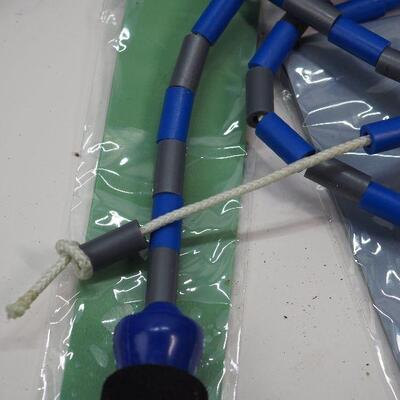 Lot 55 Bead jump ropes, therabands, sliders bands