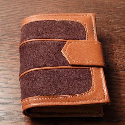 Lot 695: (2) New Wallets - J Crew & Roger Gimbel