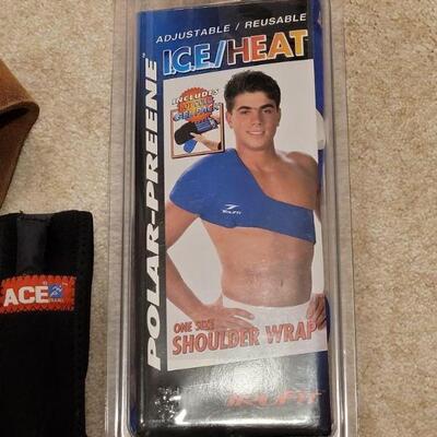 Lot 718:  Shoulder Wrap and Lifting Belt
