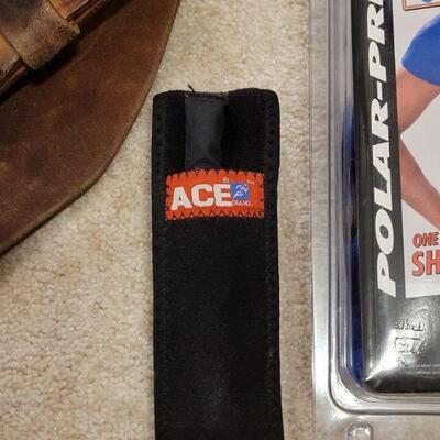 Lot 718:  Shoulder Wrap and Lifting Belt