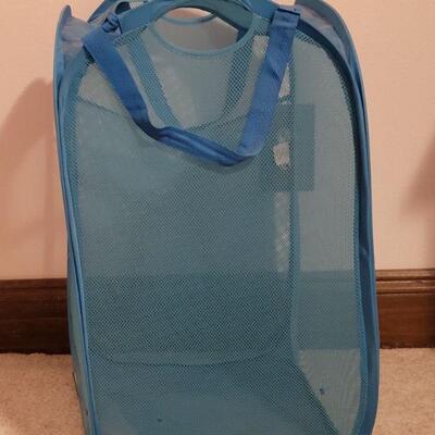 Lot 720: Blue Laundry Basket