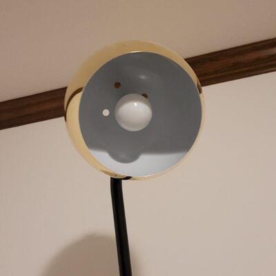 Lot 747: Mid Century Modern Black & Gold Eyeball Adjustable Lamp