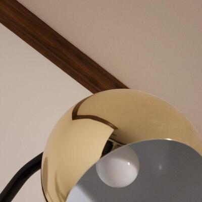 Lot 747: Mid Century Modern Black & Gold Eyeball Adjustable Lamp