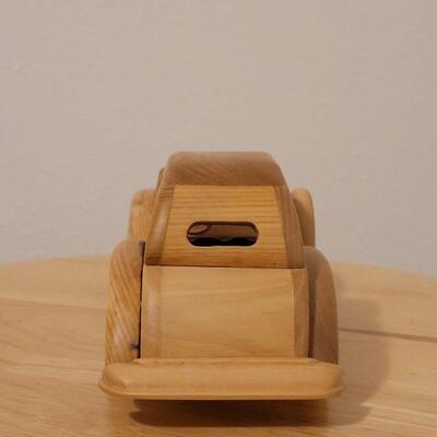Lot 764: Wood Model Car (missing a headlight)