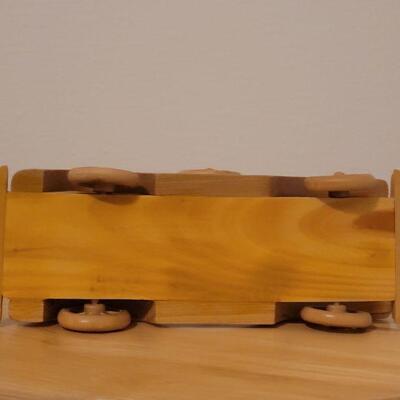 Lot 764: Wood Model Car (missing a headlight)