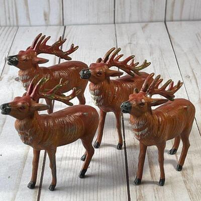 LOT 106  VINTAGE CHRISTMAS 4 PAINTED LEAD REINDEER MADE IN JAPAN