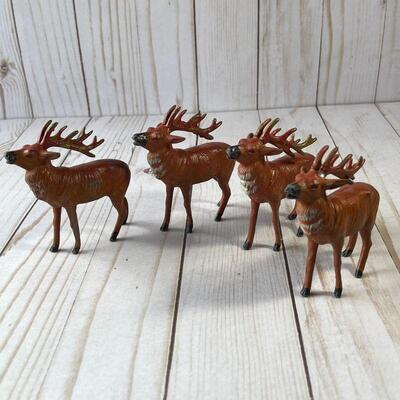 LOT 106  VINTAGE CHRISTMAS 4 PAINTED LEAD REINDEER MADE IN JAPAN