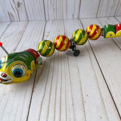 LOT 107  VINTAGE TIN LITHO TOYS JAPAN CATERPILLAR & BUTTERFLY 