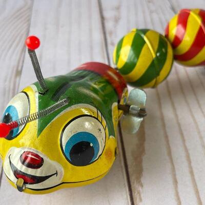 LOT 107  VINTAGE TIN LITHO TOYS JAPAN CATERPILLAR & BUTTERFLY 
