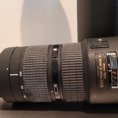 Lot 782: Vintage NIKON ED NIKKOR 80-200mm 1:2.8 lens w/ CL-43A Hard Case