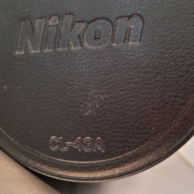 Lot 782: Vintage NIKON ED NIKKOR 80-200mm 1:2.8 lens w/ CL-43A Hard Case