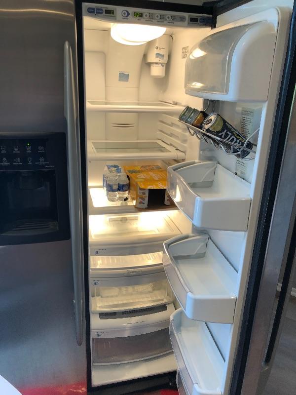 GE Profile Side by Side Refrigerator with ice and water stainless steel