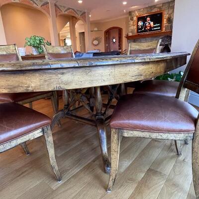 Gorgeous rustic custom kitchen table and six leather chairs