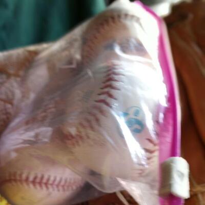 1112 - 3 Baseball Gloves, several little league and softball balls