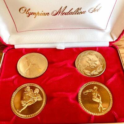 OLY 123  1984 OLYMPICS BOXED SET OF OLYMPIC MEDALLIONS GOLD COLOR COINS