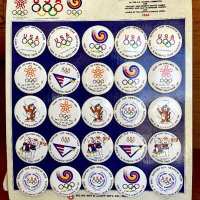 OLY 126  1988 RETAIL DISPLAY CARD OF COLLECTOR BUTTON PINS CALGARY & SEOUL HO HO ART & CRAFT 