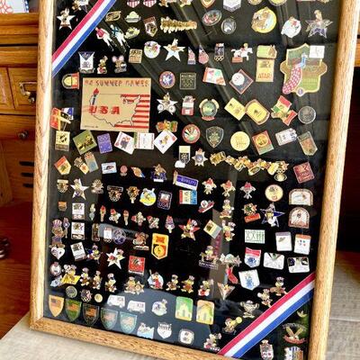 LOT 143  16 X 20 FRAMED PINS 1984 OLYMPICS LOS ANGELES SPONSORS SUPPORTERS & UNUSED FRAME 
