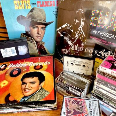 Lot 155  ELVIS MUSIC GROUP LP RECORD ALBUMS CASSETTES VHS TAPE ALOHA FROM HAWAII 