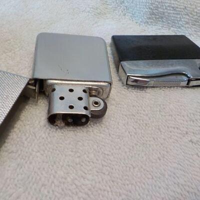2- vintage lighters Elgin Classic and Park lighters..