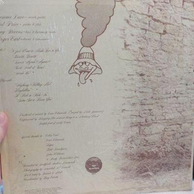 " Fog Hat 1970's". LP playing record.
