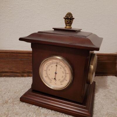Lot 931: BOMBAY Turning Thermometer, Clock ect.