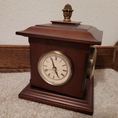 Lot 931: BOMBAY Turning Thermometer, Clock ect.