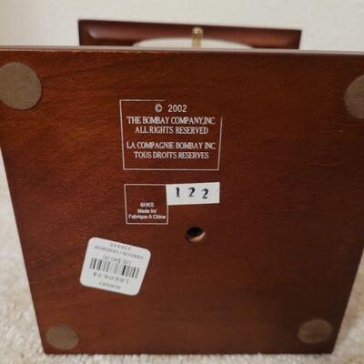Lot 931: BOMBAY Turning Thermometer, Clock ect.