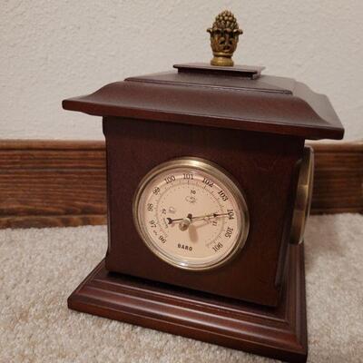 Lot 931: BOMBAY Turning Thermometer, Clock ect.