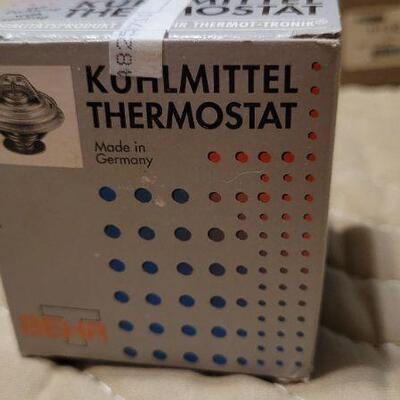 Lot 1019: Vintage New Stock MERCEDES BENZ Auto Parts - Thermostat and Oil Reservoir Cap