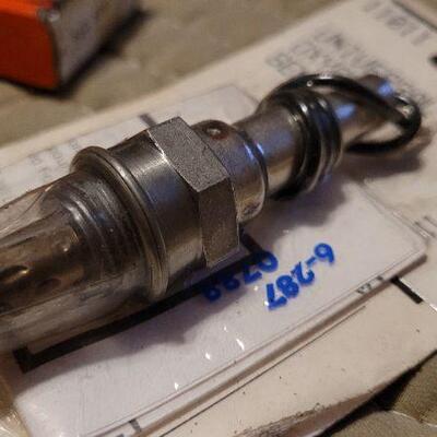 Lot 1042: Vintage New Stock OXYGEN SENSOR + Valve Stem Seals
