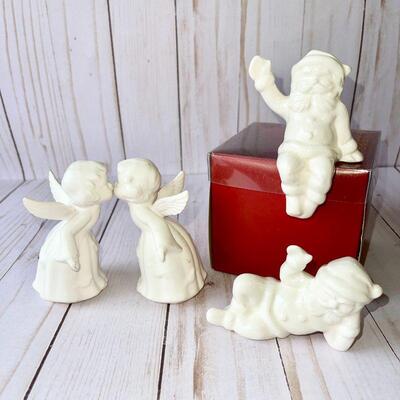 LOT 180  VINTAGE WHITE CERAMICS KISSING ANGELS & POSING SANTAS