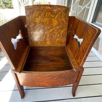 Ornately Carved Tiger Oak Accent Chair with Hidden Storage