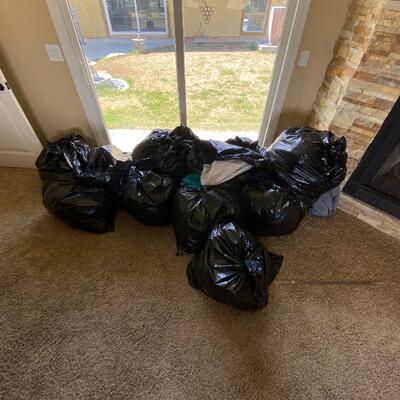 9 Bags Full of Clothes