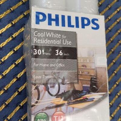 Lot 1250: (2) New PHILIPS Cool White T12 Bulbs 