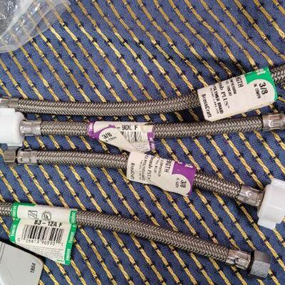 Lot 1303: Assorted NEW Plumbing Accessories 