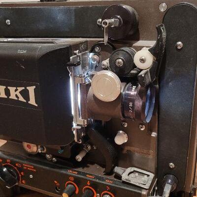 Lot 1374: Vintage EIKI Projector (runs but needs repair)