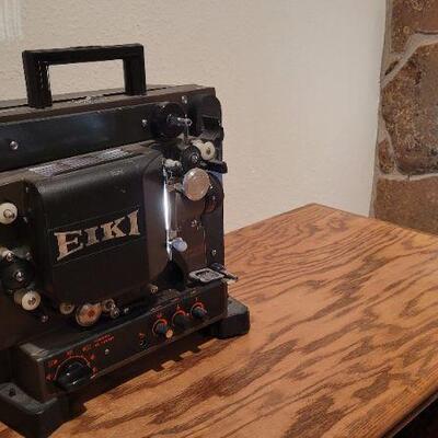 Lot 1374: Vintage EIKI Projector (runs but needs repair)