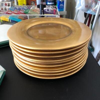 Lot 86. Eight mirrored trays and ten gold chargers--WAS $45â€“NOW $22.50