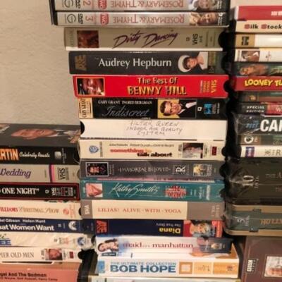 Lot 125. Approximately 36 VHS and DVDs--WAS $25â€“NOW $12.50