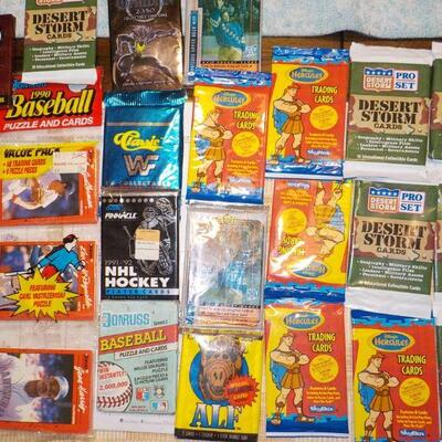 Over 25 un-opened Collectors cards/ Batman, 1990 Baseball, NHL Hockey, WWF.